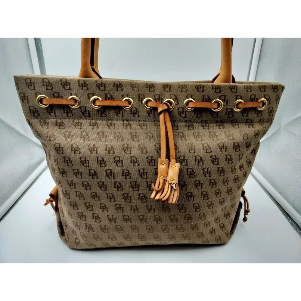Dooney & And Bourke Tulip Tassel Signature Monogram Canvas Logo Tote Bag Tan